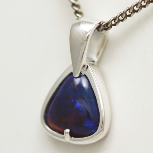 Stirling silver Pendant with SOLID BLACK OPAL Sparkling reds and orange
